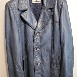 Vintage leather jacket.  Dark grey. Fits a men's medium to large.